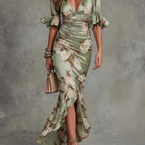 Isabella - Asymmetrical long dress in green satin with V-neck, flared puff sleeves, and floral pattern