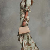 Isabella - Asymmetrical long dress in green satin with V-neck, flared puff sleeves, and floral pattern